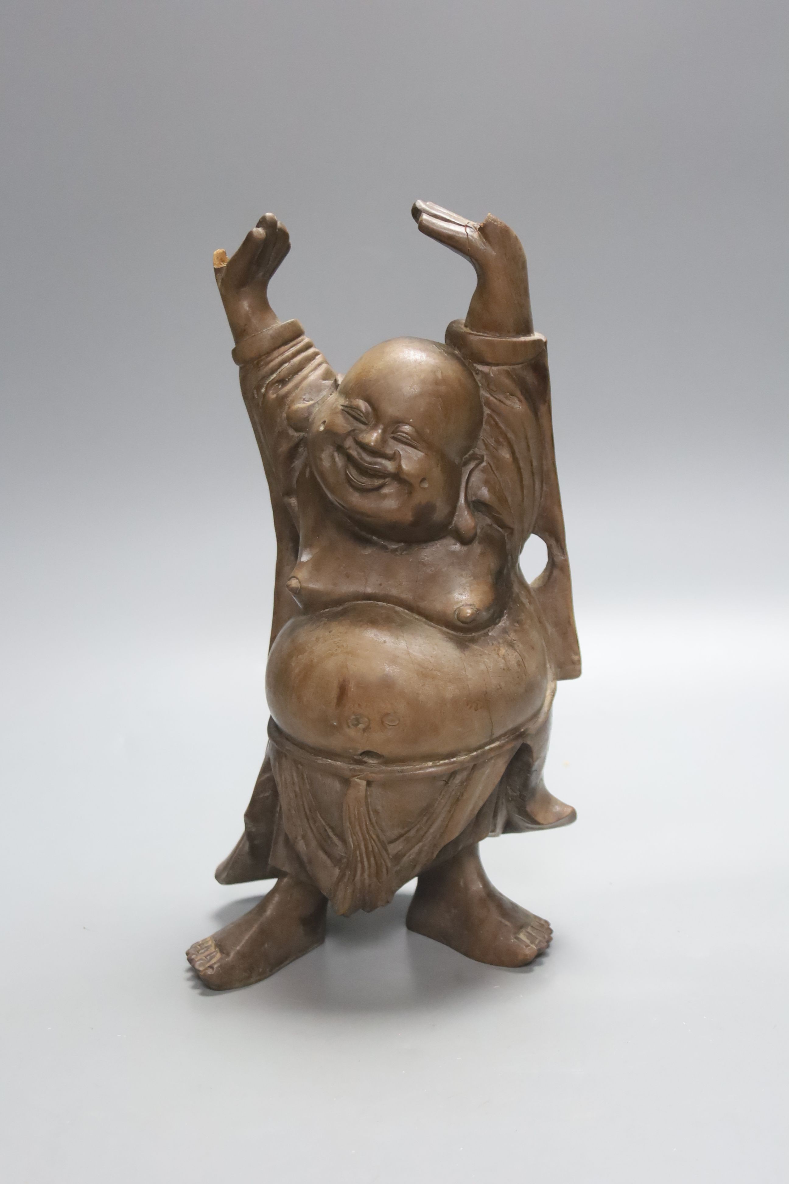 A Chinese Straits famille rose ‘dragon’ bowl, 11cm, and a carved wood figure of a Budai, 28cm